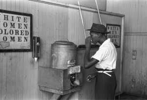 -Colored-_drinking_fountain_from_mid-20th_century_with_african-american_drinking